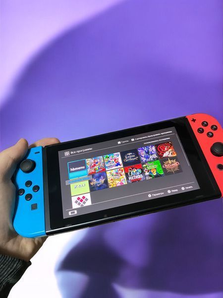 Прошитая портативная консоль Nintendo Switch 128 ГБ (чипованная) + 10 игр, Гарантия 22111 фото