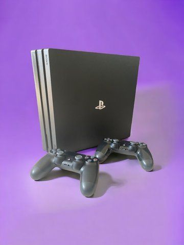 Стаціонарна ігрова консоль PlayStation 4 PRO + 2 джойстики 22111 фото